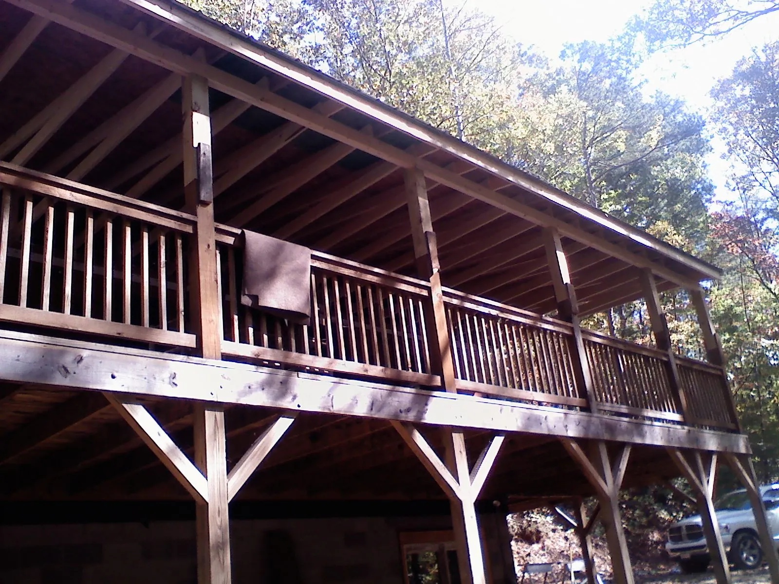 Timber framing under a new elevated porch and deck — Roof Leak Repair in Felt by Roofing Brothers